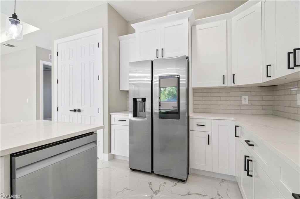 1561 Nw 26th Pl - Photo 6 of 27