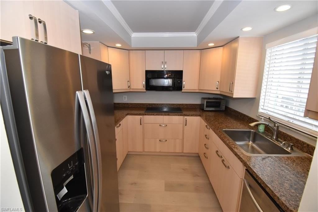 5667 Rattlesnake Hammock Rd Apt 205b - Photo 2 of 26