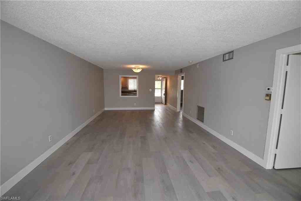 5667 Rattlesnake Hammock Rd Apt 205b - Photo 4 of 26