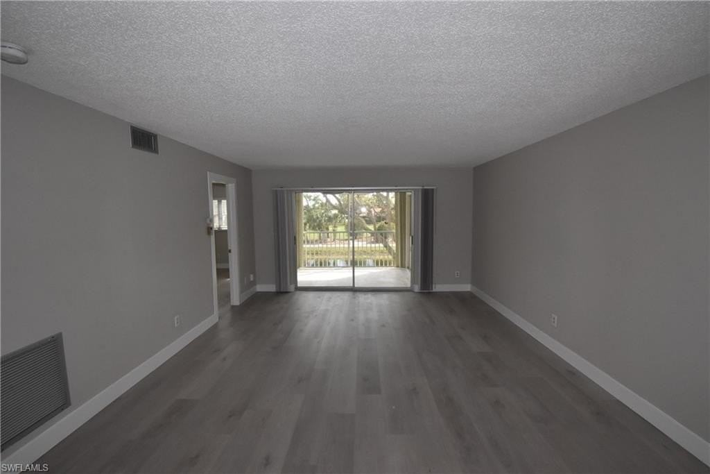 5667 Rattlesnake Hammock Rd Apt 205b - Photo 6 of 26