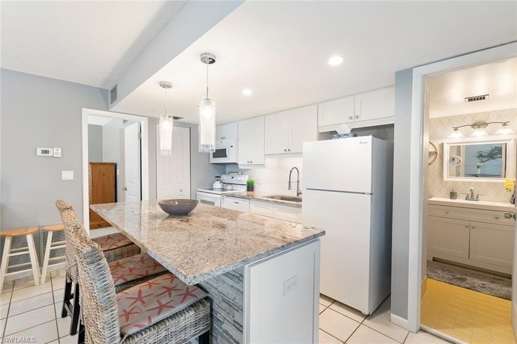 240 Palm Dr Unit 48-1 - Photo 3 of 17