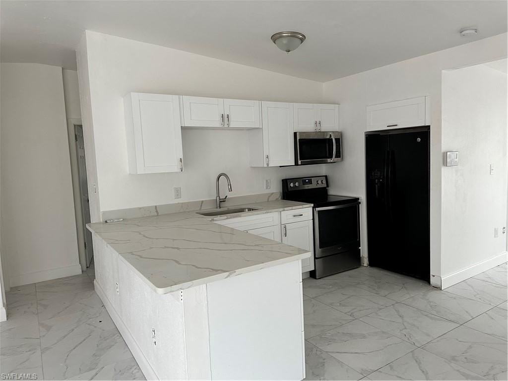 18633 Matanzas Rd - Photo 2 of 6