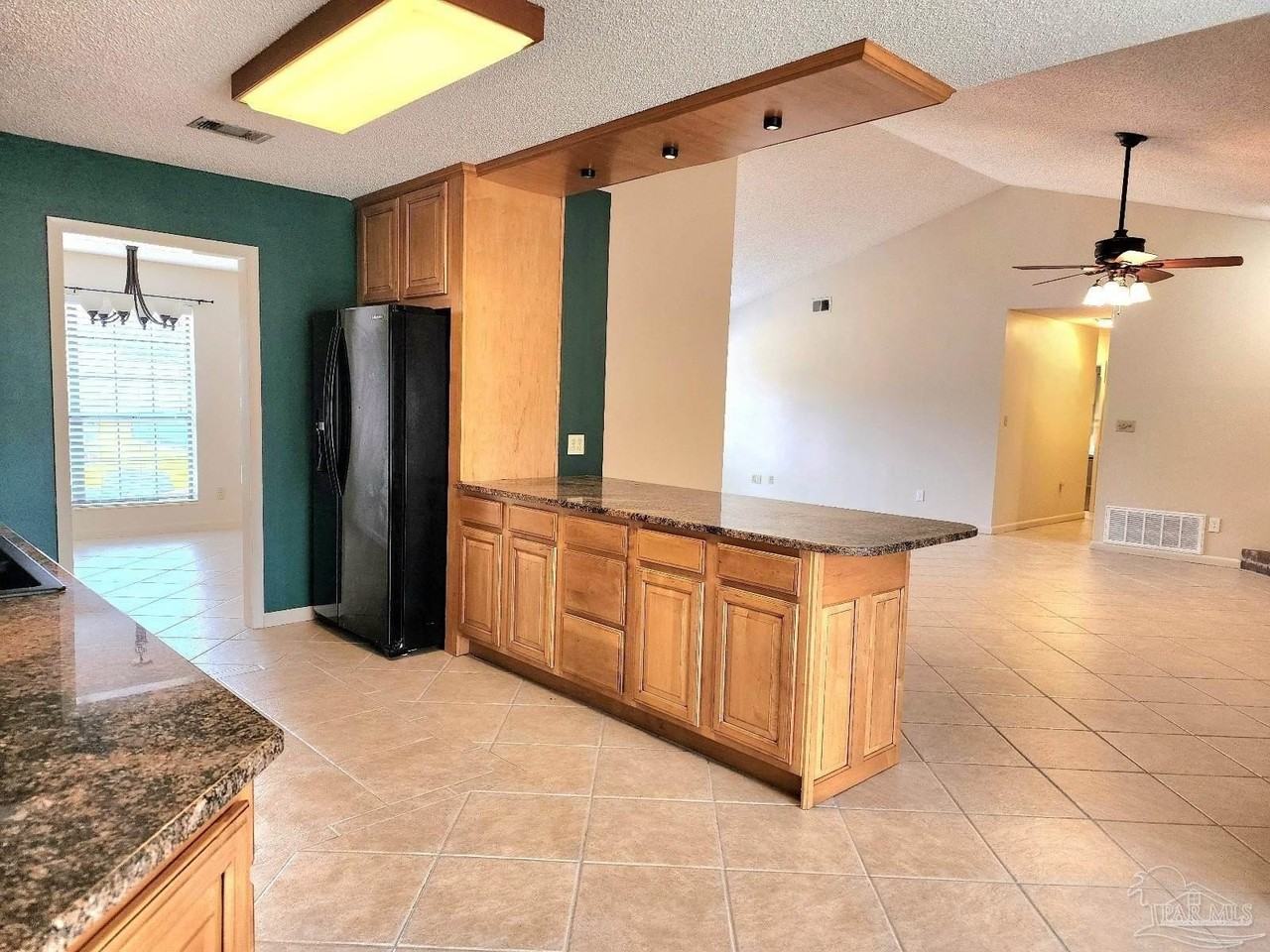 9001 Woodrun Rd - Photo 6 of 24