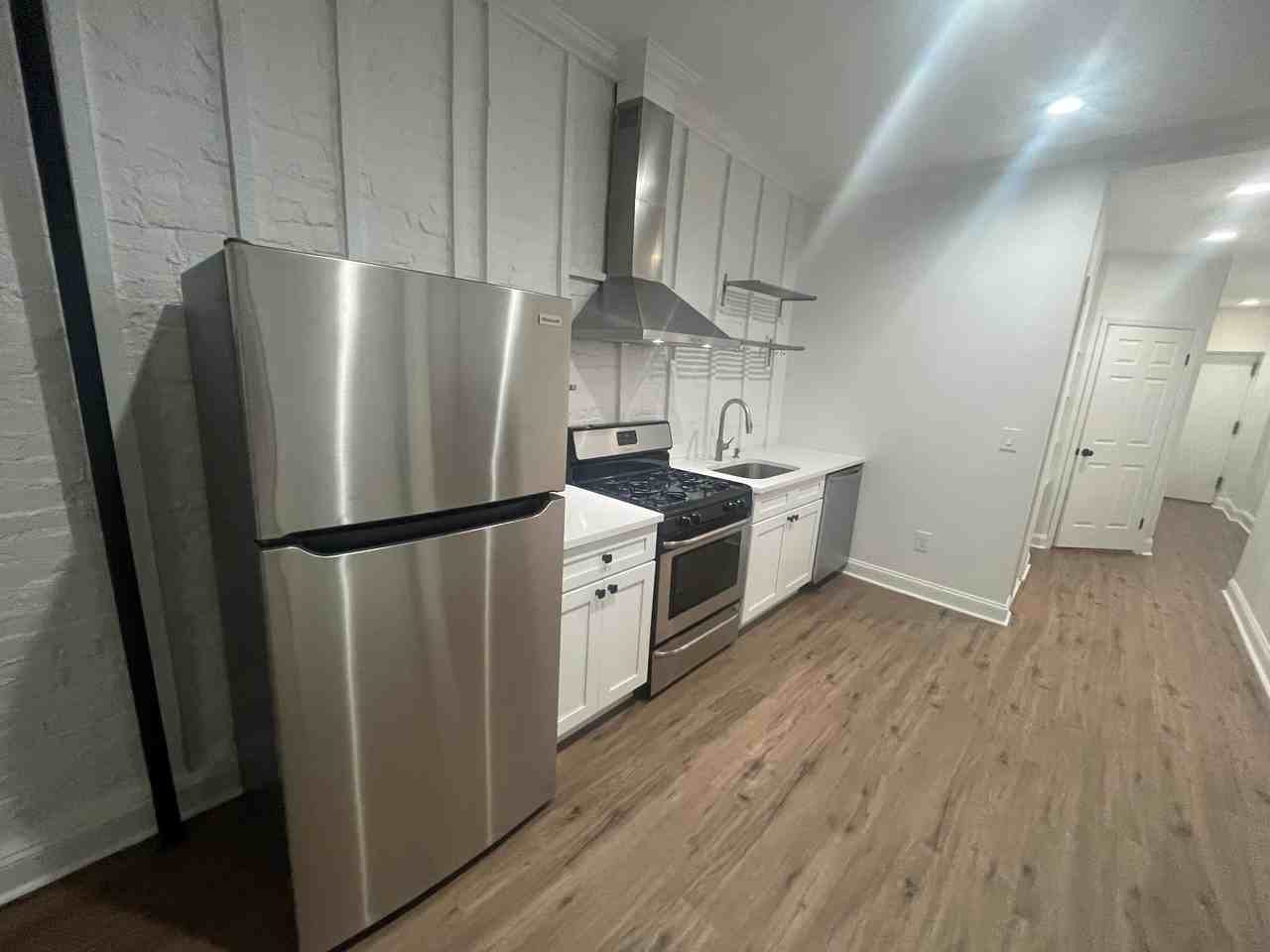 313 Stockholm St Apt 1 - Photo 2 of 15