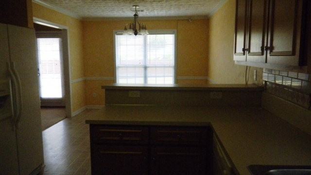 8028 Garrett Pines Dr - Photo 4 of 17