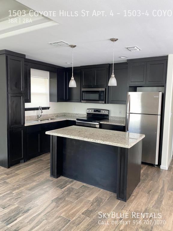 COYOTE HILLS & - Photo 2 of 8