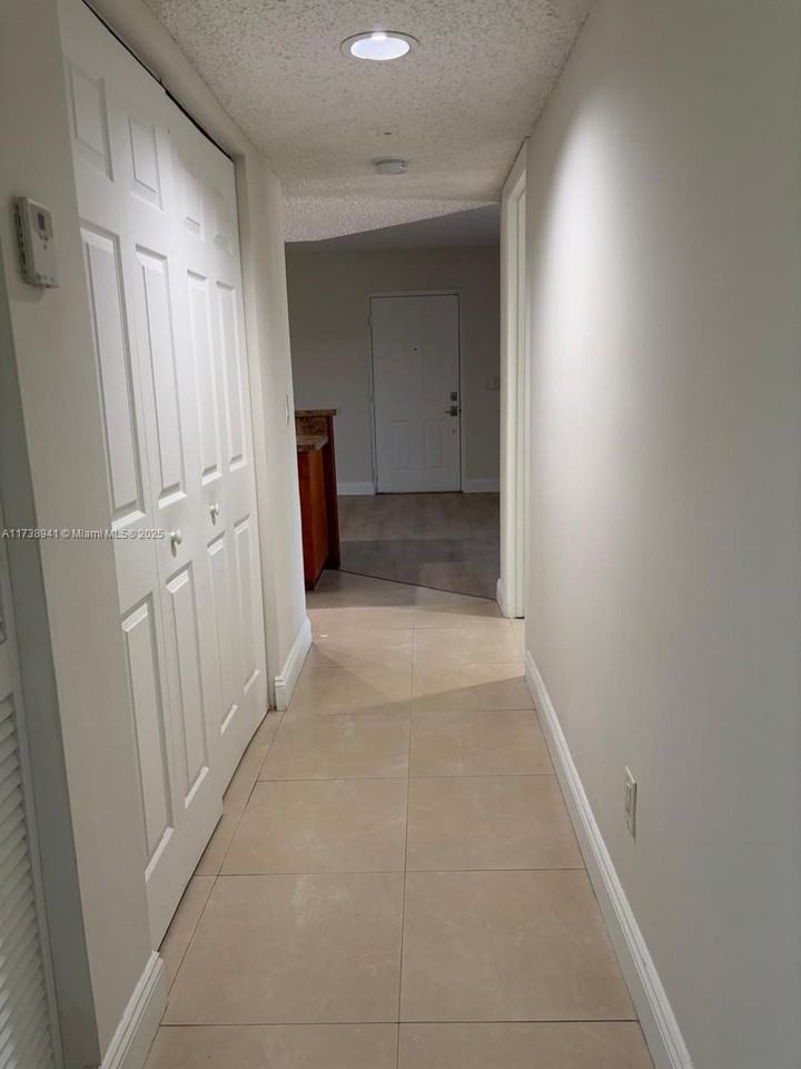 Nw 57th Ave #100 - Photo 3 of 8