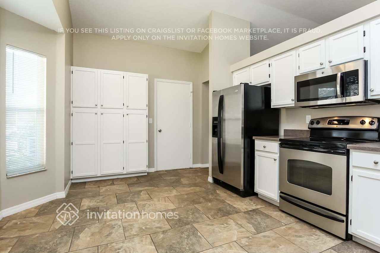 4416 11th Ave E - Photo 6 of 11