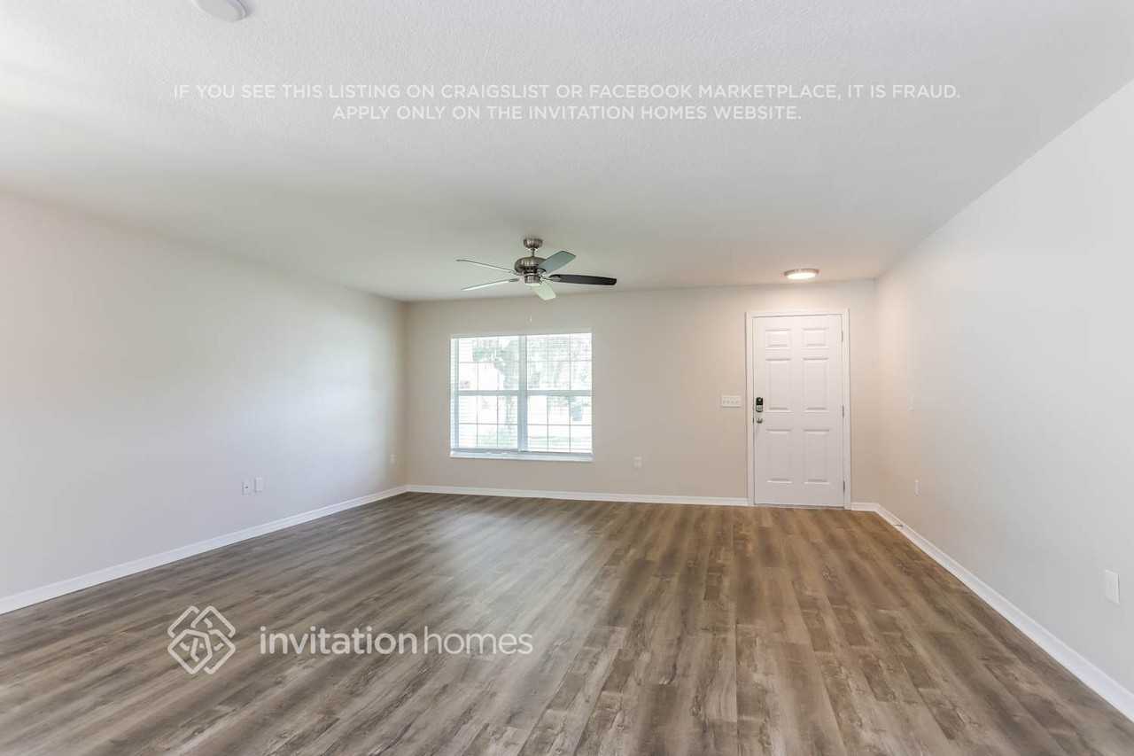 11118 Hidden Breeze Dr - Photo 2 of 16