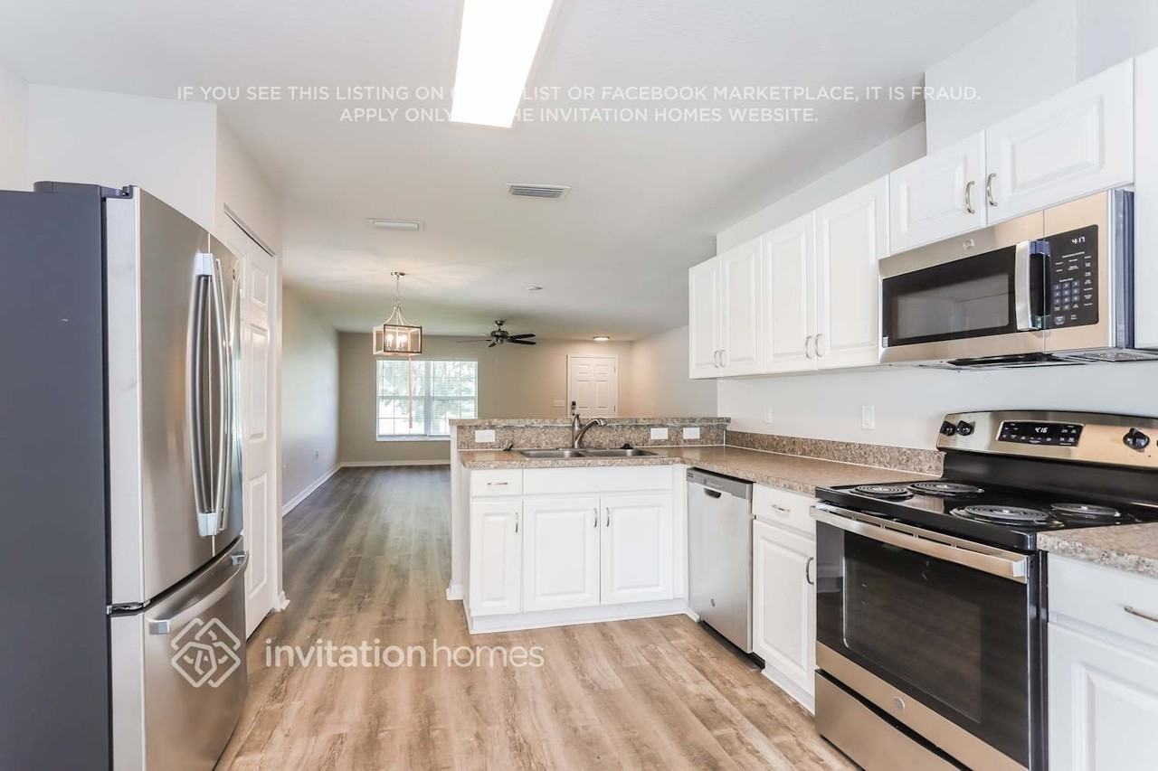 11118 Hidden Breeze Dr - Photo 5 of 16