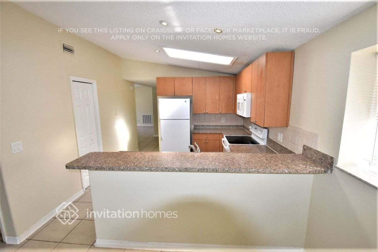 9709 Rushwood Ct - Photo 5 of 25