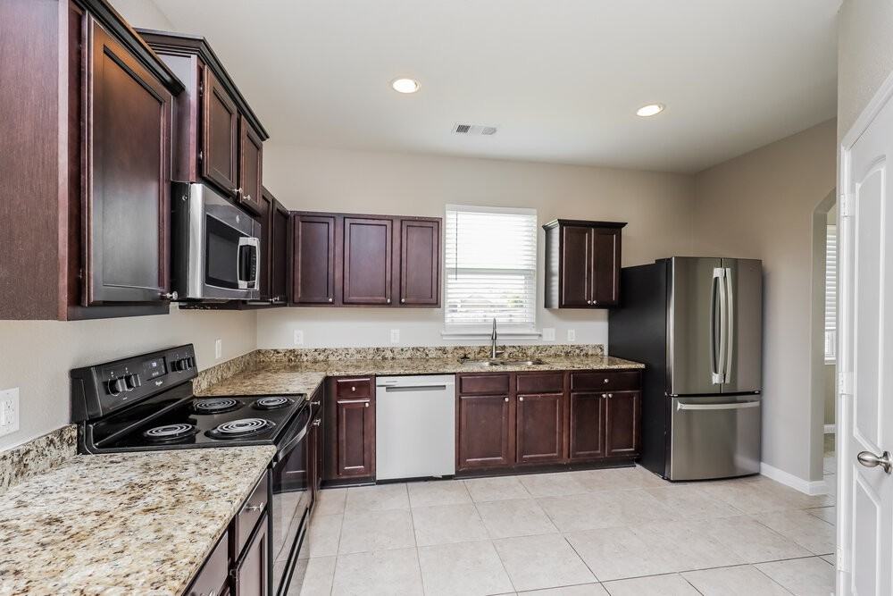 1017 Princewood Dr - Photo 6 of 16