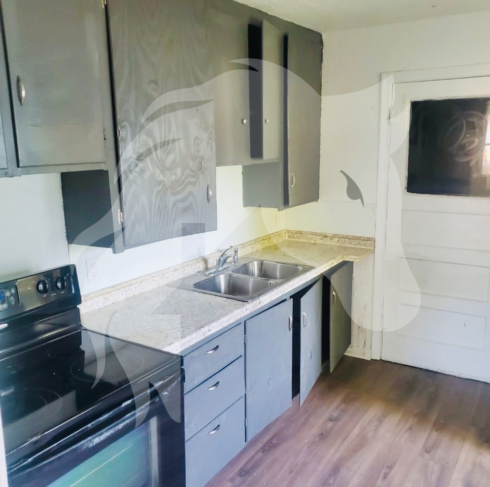 208 E Ponca St - Photo 3 of 5