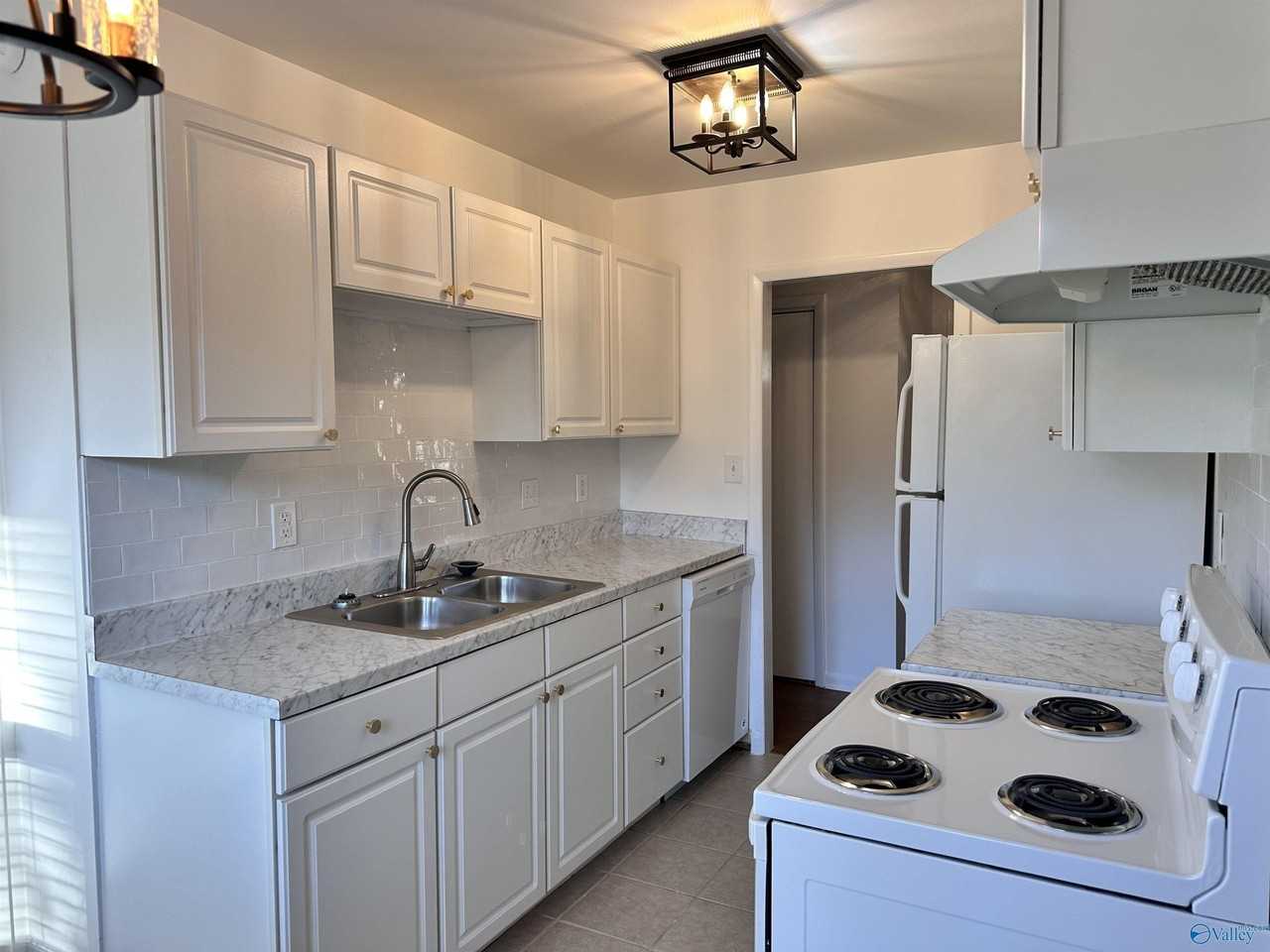 9727 Wallwood Dr Se - Photo 7 of 27