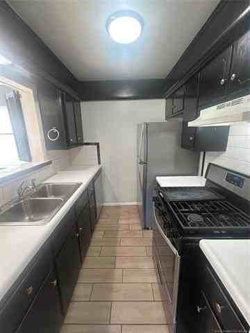 4909 S Utica Ave Unit D - Photo 6 of 7