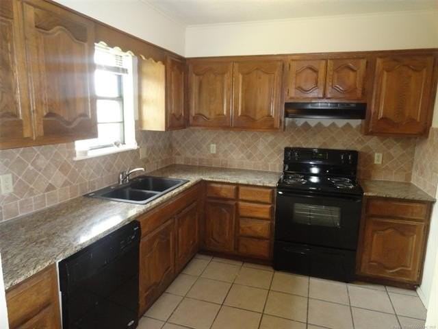 7310 S Saint Louis Ave - Photo 2 of 6