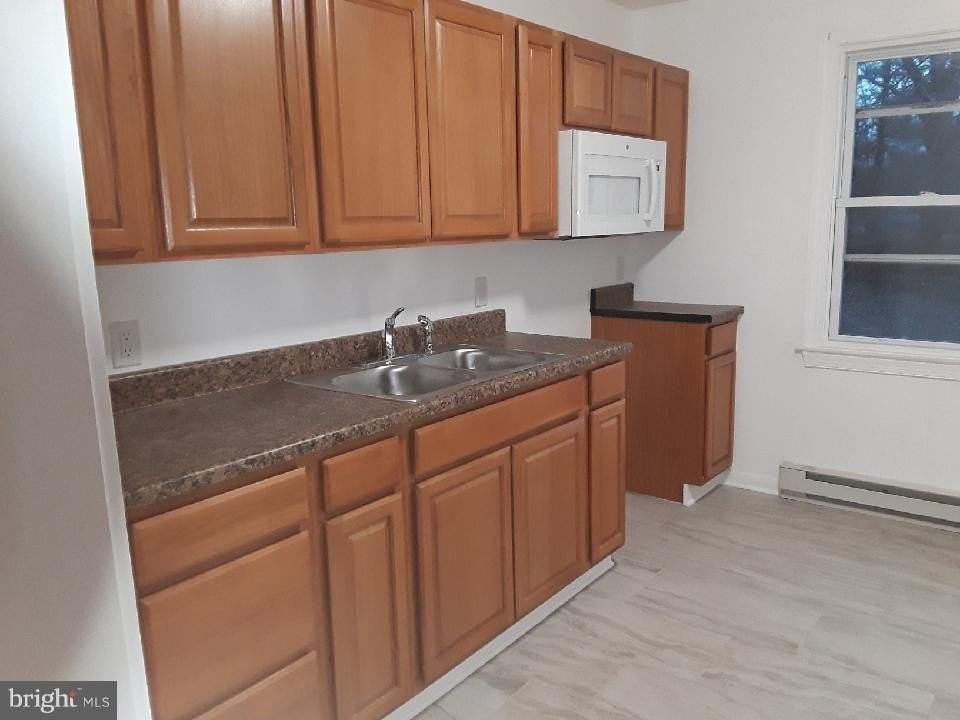 239 Seneca Ave - Photo 4 of 9