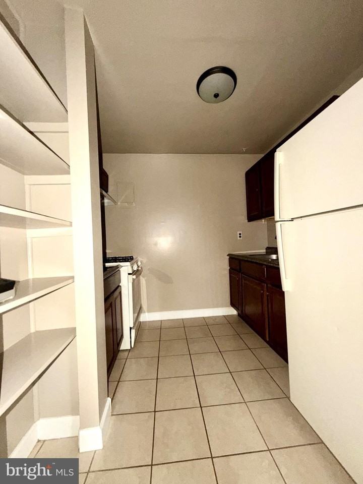 9282 Adelphi Rd #303 - Photo 6 of 16