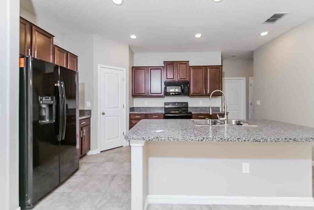 10009 Rose Petal Pl - Photo 5 of 16