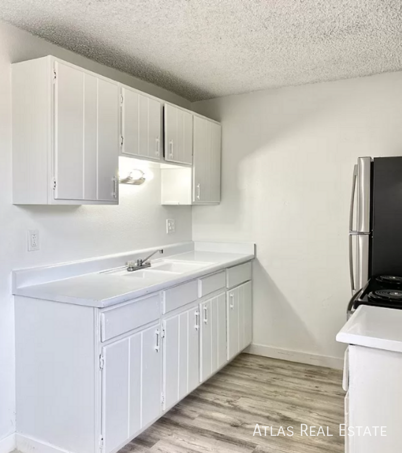 15571-15573 E 13th Avenue - Photo 2 of 14