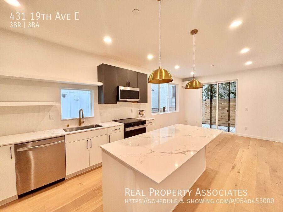 431 19th Ave E - Photo 3 of 37