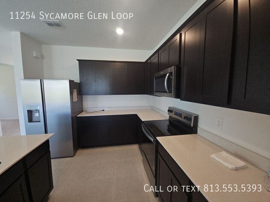 11254 Sycamore Glen Loop - Photo 7 of 50