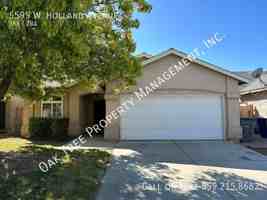 featured image of 5595 W Holland Ave