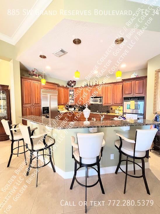 885 Sw Grand Reserves Blvd - Photo 3 of 16