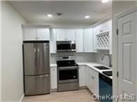 24820 Jericho Tpke Unit 2nd - Photo 3 of 4