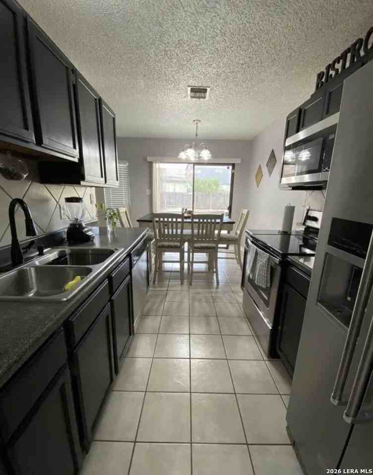 6907 Sunset Village Dr - Photo 3 of 5