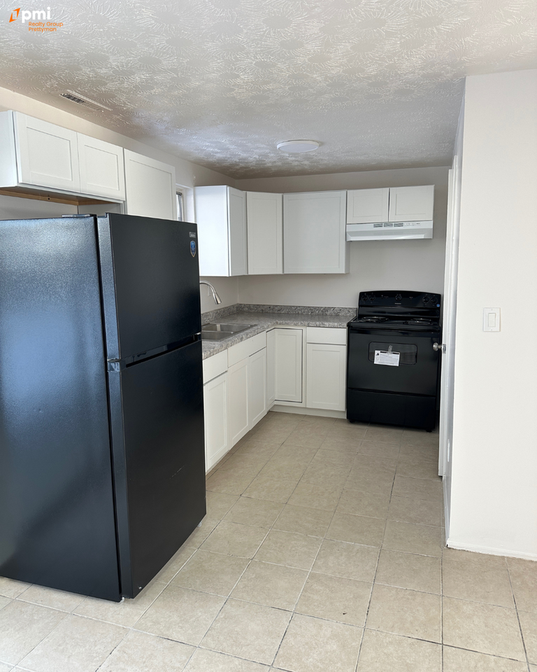 Hidden Village TownHomes - Photo 4 of 9