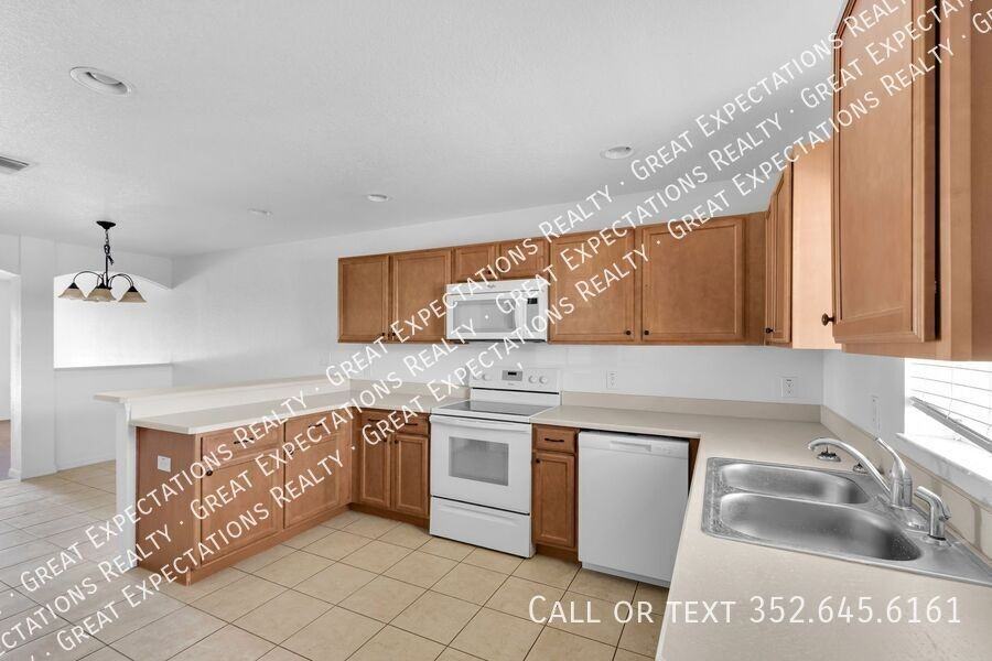 10583 Se 67th Ct - Photo 4 of 19