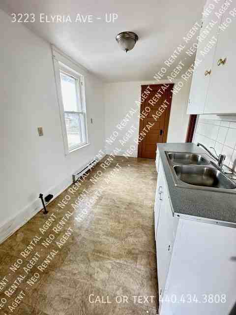 3223 Elyria Ave #UP - Photo 4 of 5