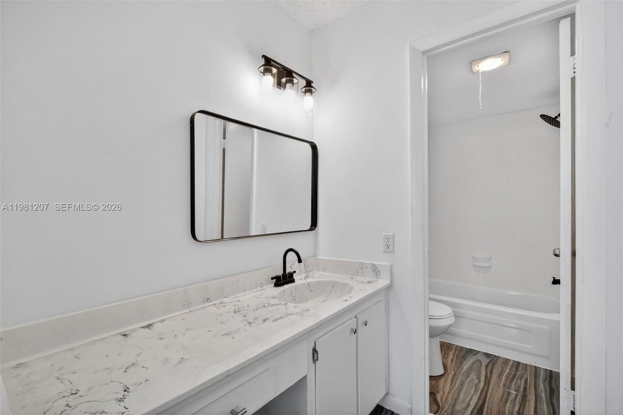 9091 Lime Bay Blvd #A107 - Photo 3 of 36