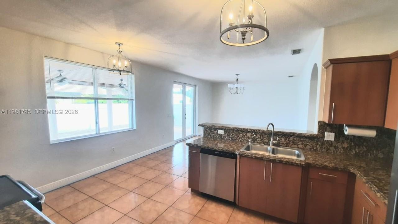 8767 Nw 139th Ter - Photo 3 of 7