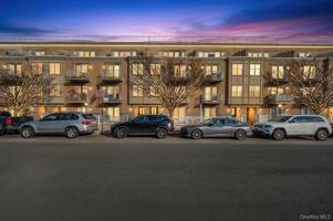 featured image of 10220 Rockaway Beach Blvd Unit 1a