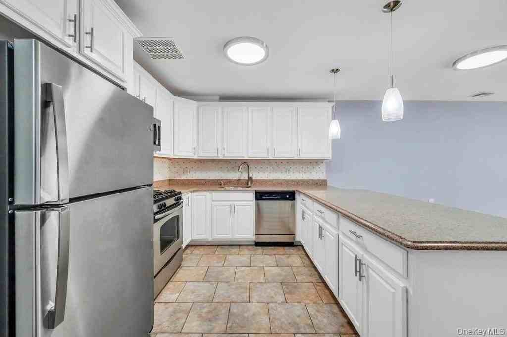 10220 Rockaway Beach Blvd Unit 1a - Photo 7 of 18