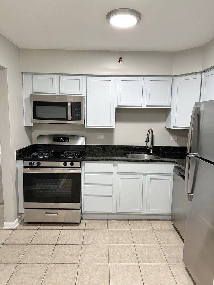 8635 S 84th Ct Unit 1s - Photo 6 of 11