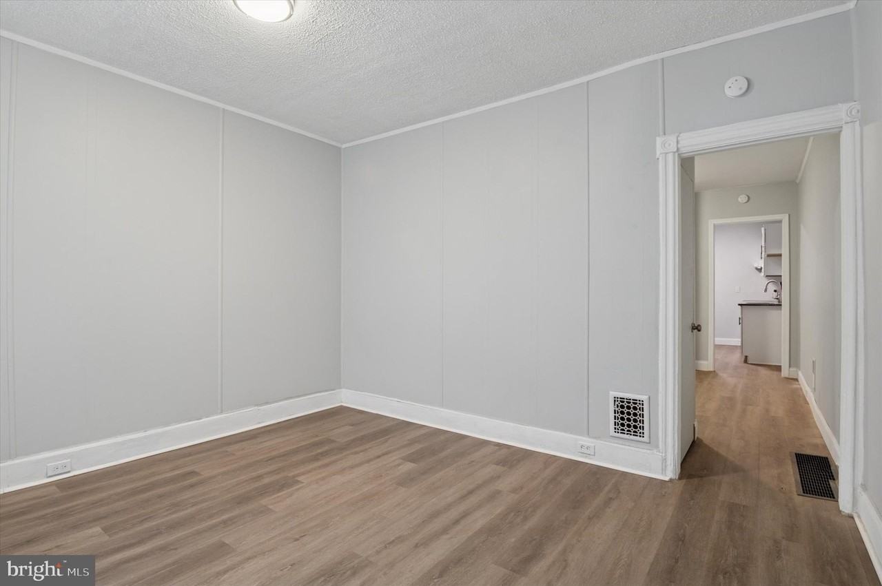 305 E 22nd St - Photo 3 of 15