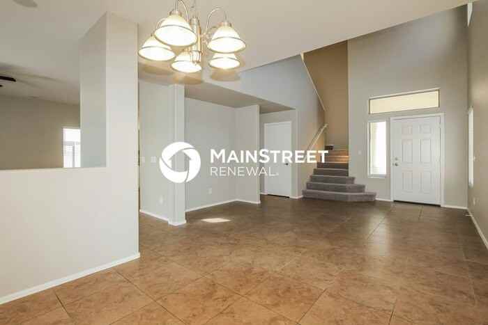 13440 W Gelding Dr - Photo 5 of 17