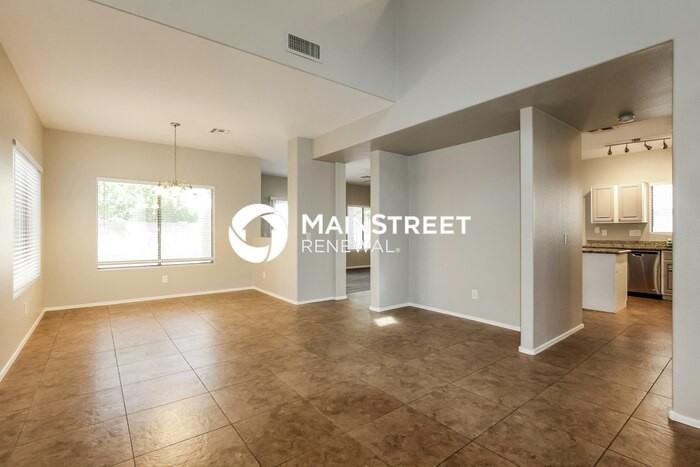 13440 W Gelding Dr - Photo 6 of 17