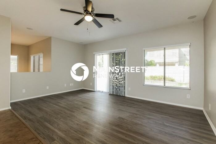 13440 W Gelding Dr - Photo 7 of 17