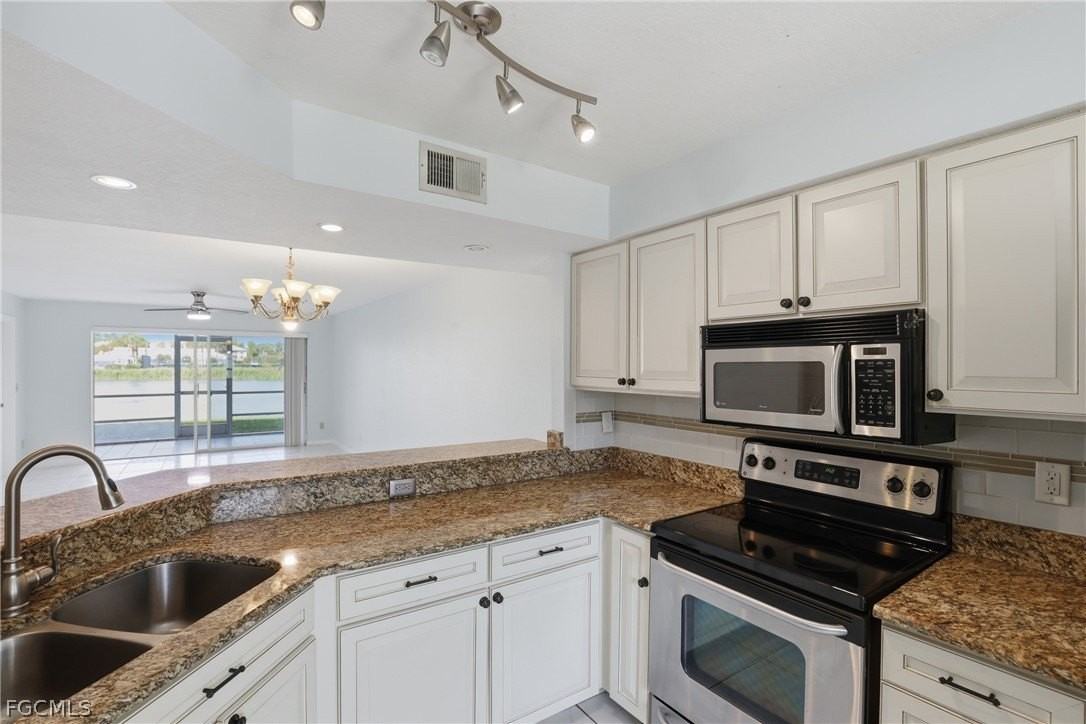 9580 Victoria Ln Unit A102 - Photo 2 of 34