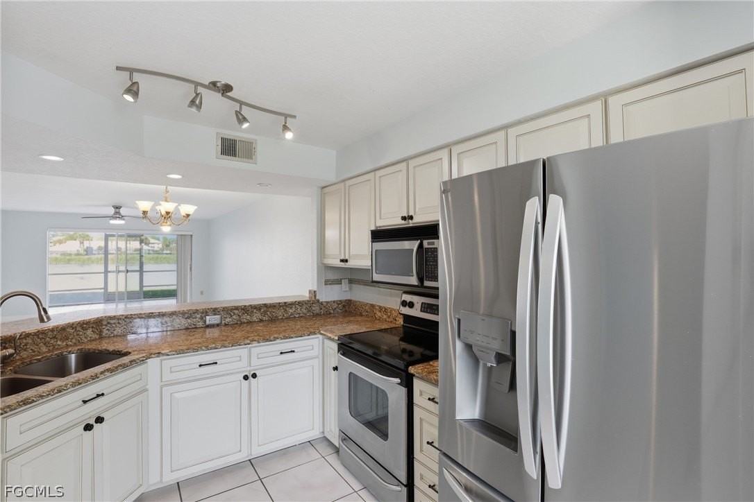 9580 Victoria Ln Unit A102 - Photo 3 of 34