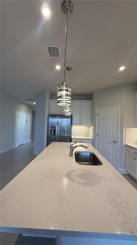 11620 61st St E - Photo 7 of 44