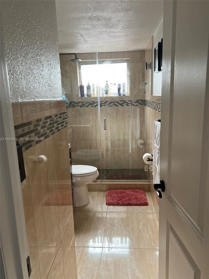 13715 Kendale Lakes Cir #A304 - Photo 5 of 34