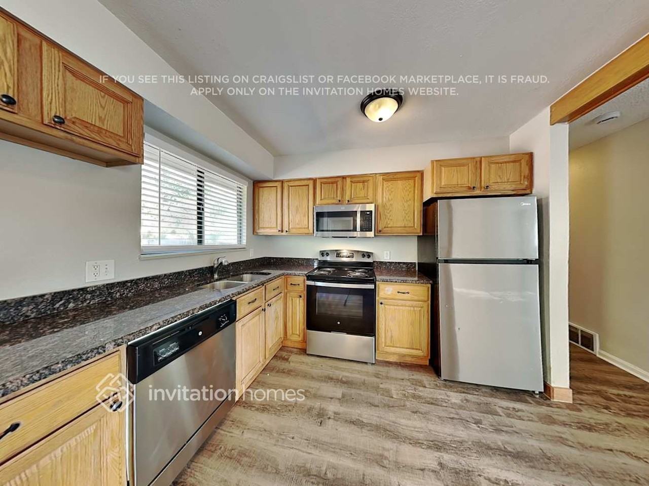 1617 S Sedalia St - Photo 6 of 23