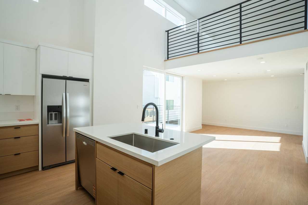 New Construction 3 bed/ 3 bath Townhome w Private 2 car garage + Oversized Balcony - Photo 2 of 19