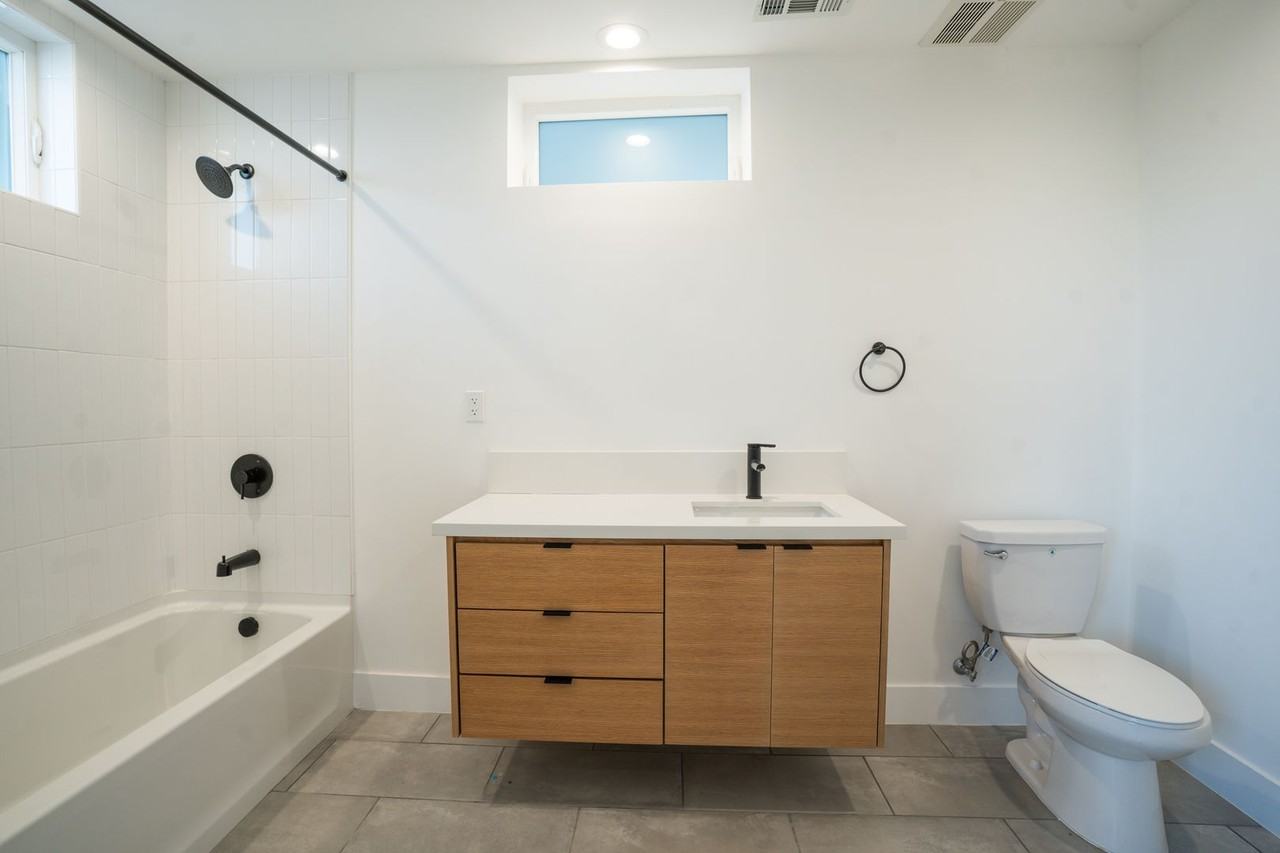 New Construction 3 bed/ 3 bath Townhome w Private 2 car garage + Oversized Balcony - Photo 6 of 19