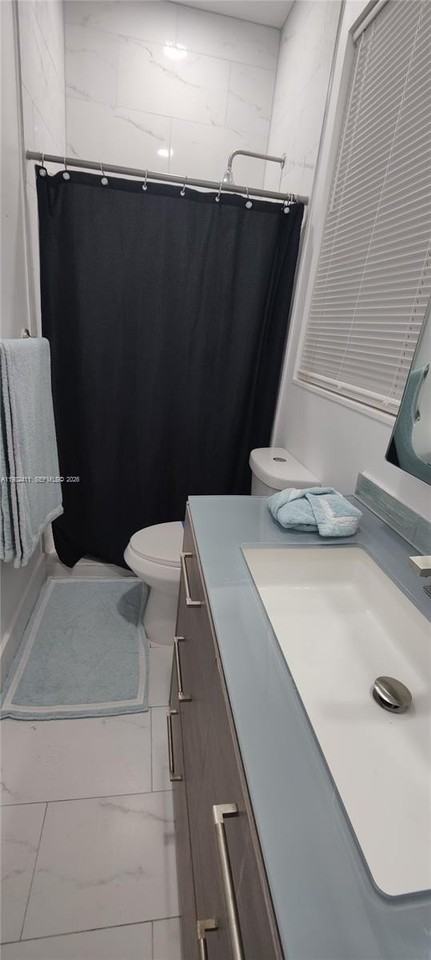 590 Nw 131st St - Photo 3 of 3